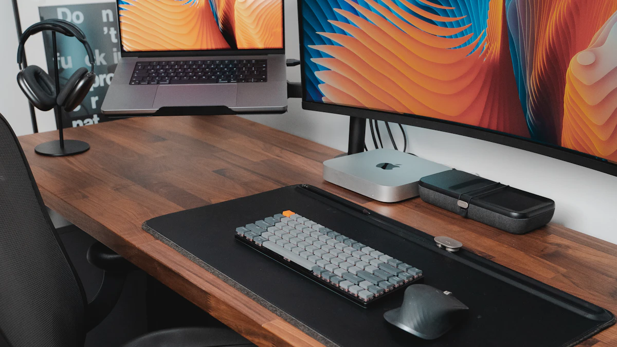 Laptop and external monitor on a wooden office desk